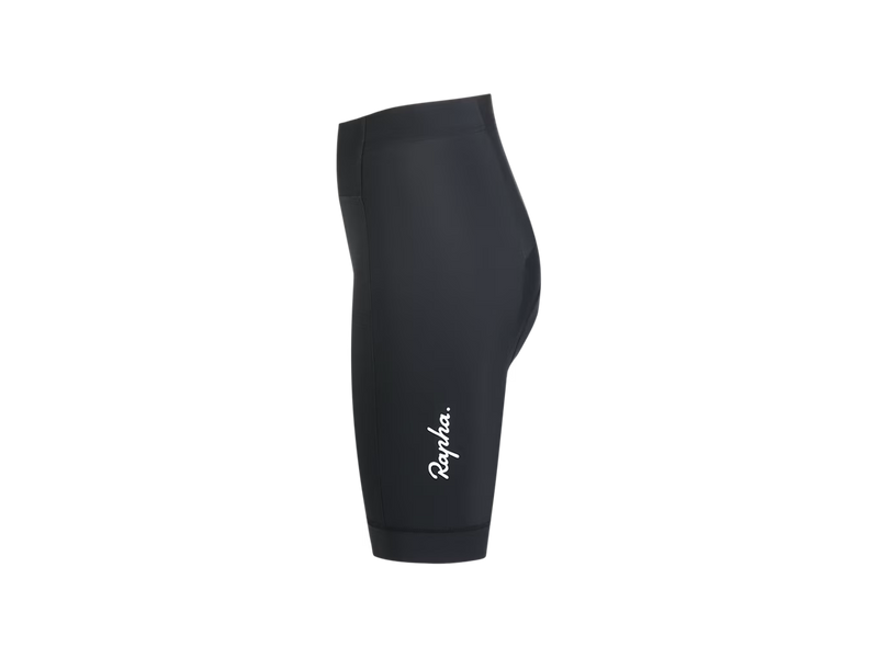 Black full-length cycling tights with a white 'Rapha' script logo on the lower left leg, shown from the side against a plain white background.
