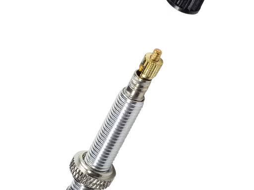 Metallic nozzle with gold fitting on a white background