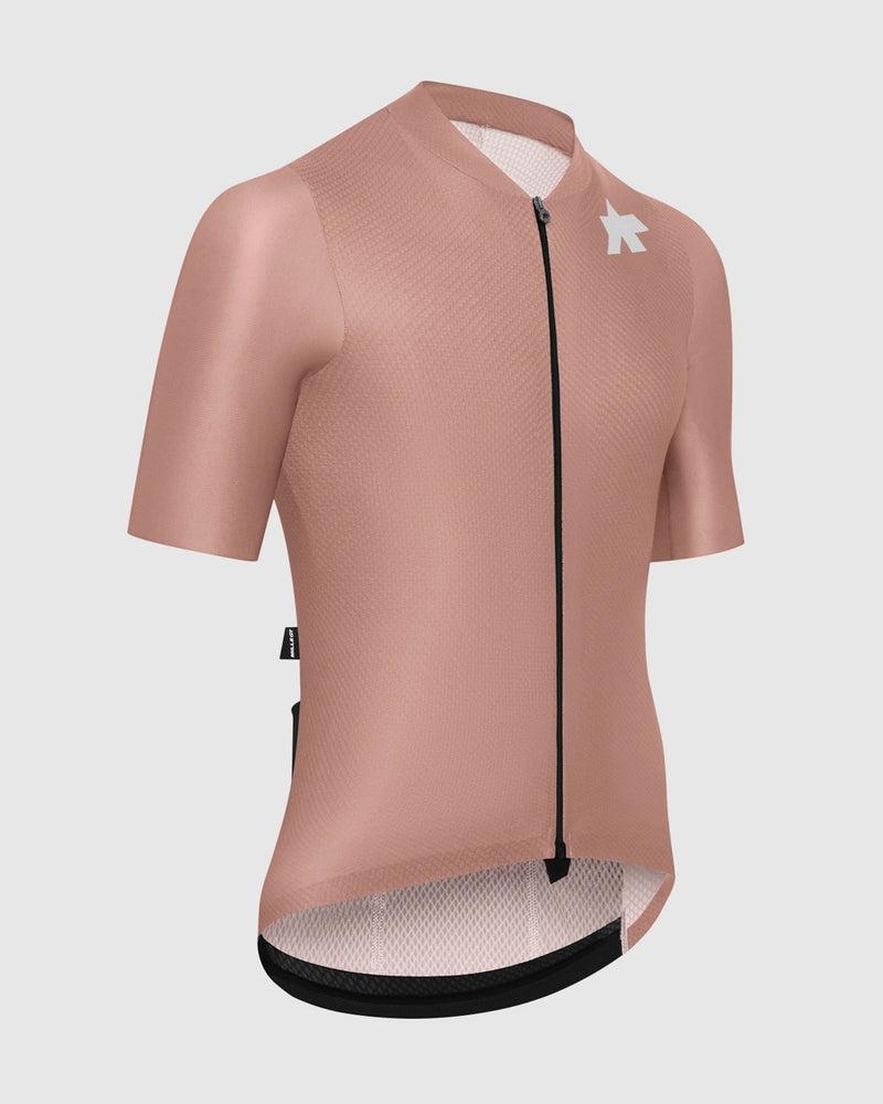 Cycling jersey in a light brown color with a brand logo on a white background