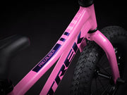 Close-up of a pink bicycle frame with 'PreCaliber' branding on a black background