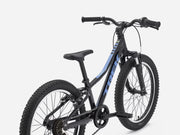 Blue children's bicycle with blue accents on a white background