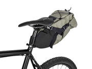 Bicycle with a green saddle bag attached to the seat