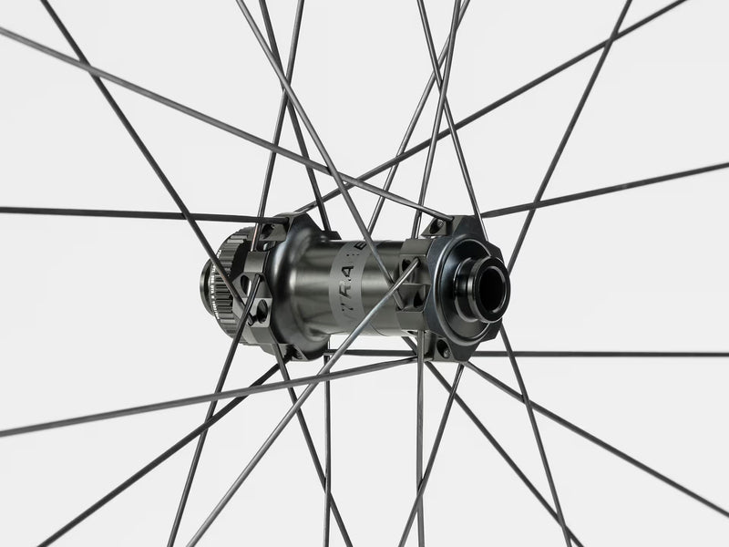 Close-up of a bicycle wheel hub on a white background