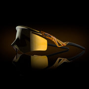 Sunglasses with a reflective surface on a dark background