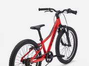 Bright Red children's bicycle on a white background