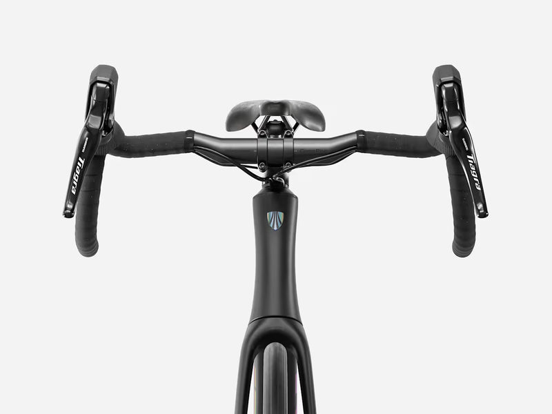 Trek Domane SL 4 Gen 5 in Matte Deep Smoke, close-up of handlebars, Shimano Tiagra brake controls, and Trek frame logo