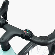 Wahoo KICKR CORE 2 with Zwift Cog and Click setup showing Zwift Click controllers mounted on both sides of a bicycle handlebar