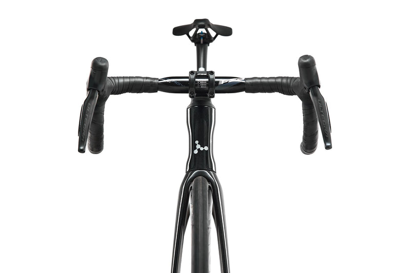 Close-up of a black bicycle handlebar and frame on a white background
