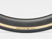Close-up of a bicycle tire with 'Aeolus RSL' branding on a white background