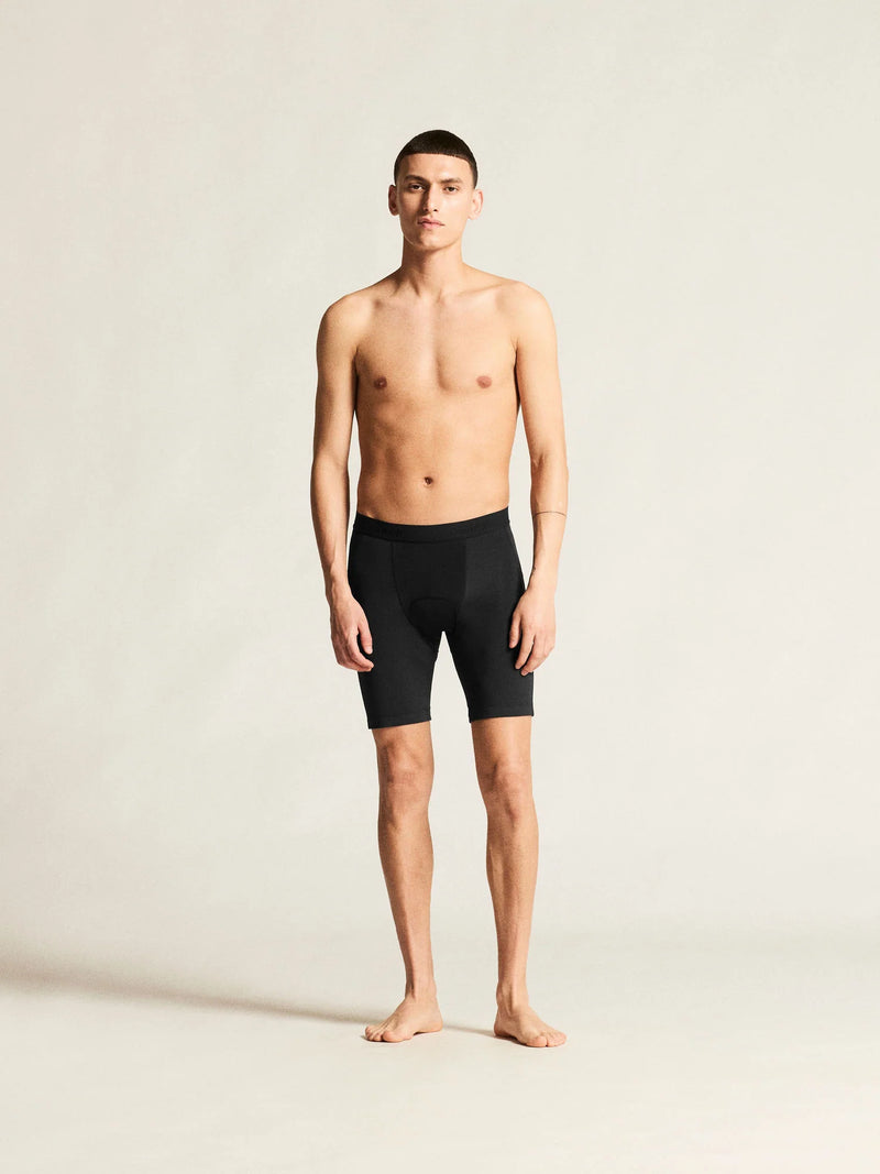 Full-length front view of man wearing black Craft Everyday Bike Liner Shorts with a comfortable fitted look