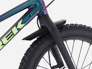 Trek Wahoo 20 Trail kids’ mountain bike in Emerald Iris (iridescent purple), close-up of the front wheel and carbon fork showing the front brake and tire