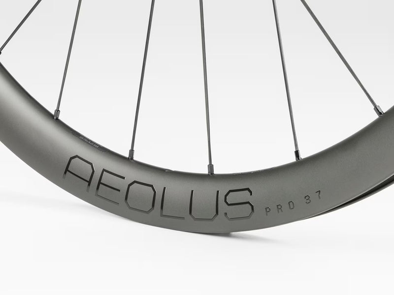 Bicycle wheel with 'Aeolus' branding on a white background
