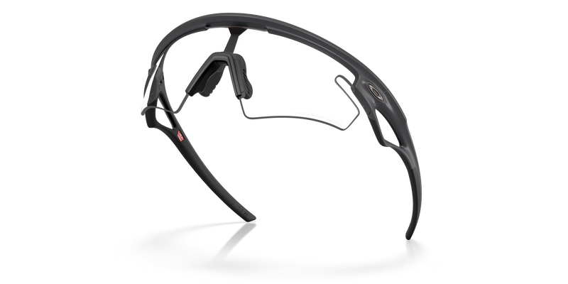 Black sunglasses with a clear lens on a white background