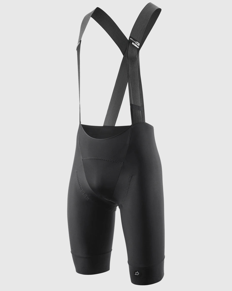 Black cycling bib shorts on a light gray background