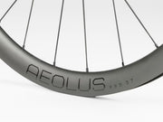 Bicycle wheel with 'Aeolus' branding on a white background