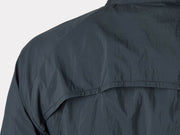 close up of windhsell and stitching detail of a black woman's cycling jacket