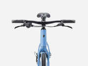 Blue hybrid fitness bicycle on a white background