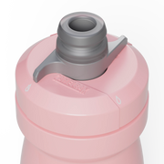 Close-up of a pink water bottle with a gray cap on a white background