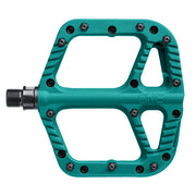 Teal bicycle pedal with 'One' branding on a white background