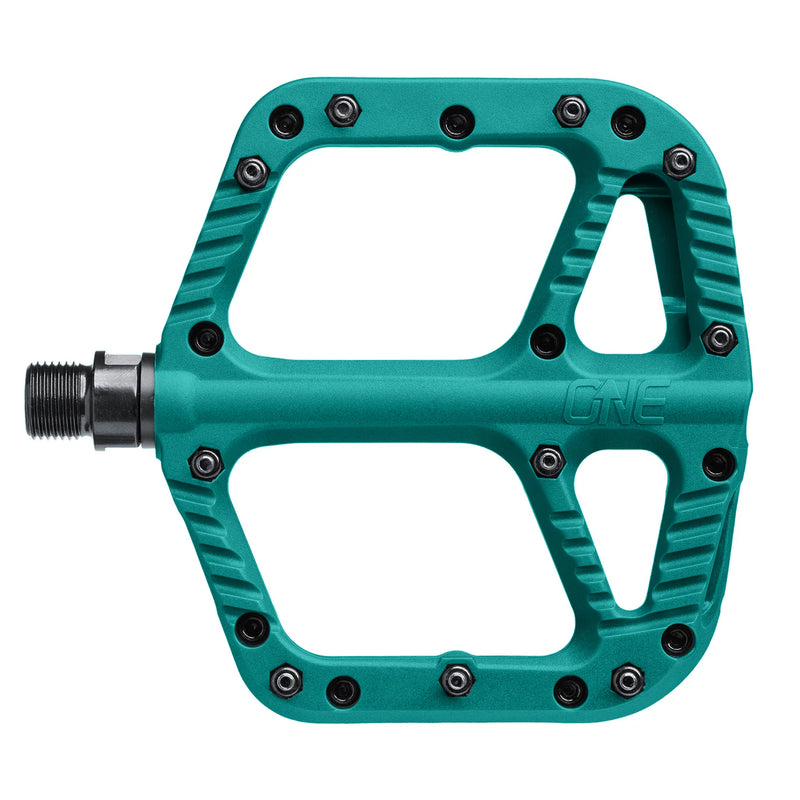Teal bicycle pedal with 'One' branding on a white background