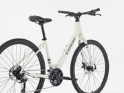 White bicycle with black components on a white background