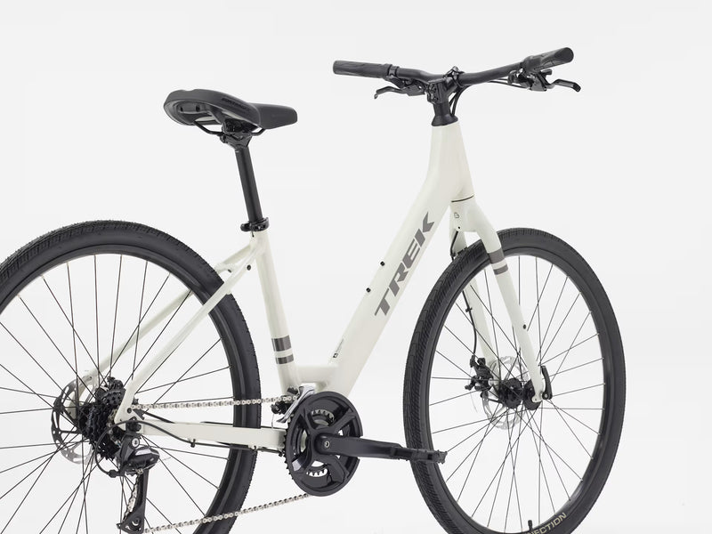 White bicycle with black components on a white background