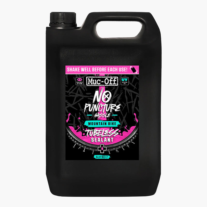 Black container of Muc-Off No Puncture Hassle tubeless sealant on a white background