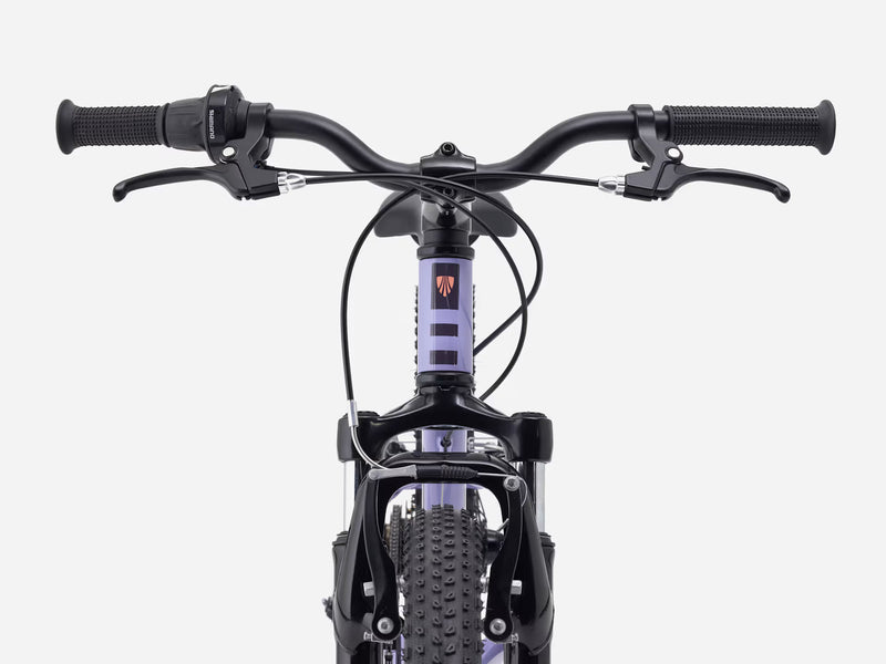Close-up of a bicycle handlebar and front wheel on a white background