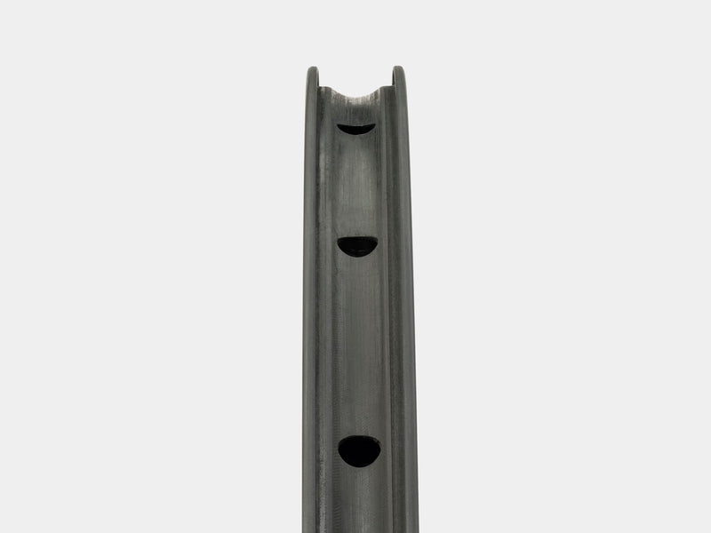 White vertical radiator on a white background