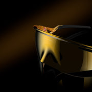 Black container with a reflective surface on a dark background