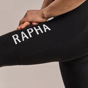 Man wearing Rapha Bib, Thigh, with Rapha Logo visible