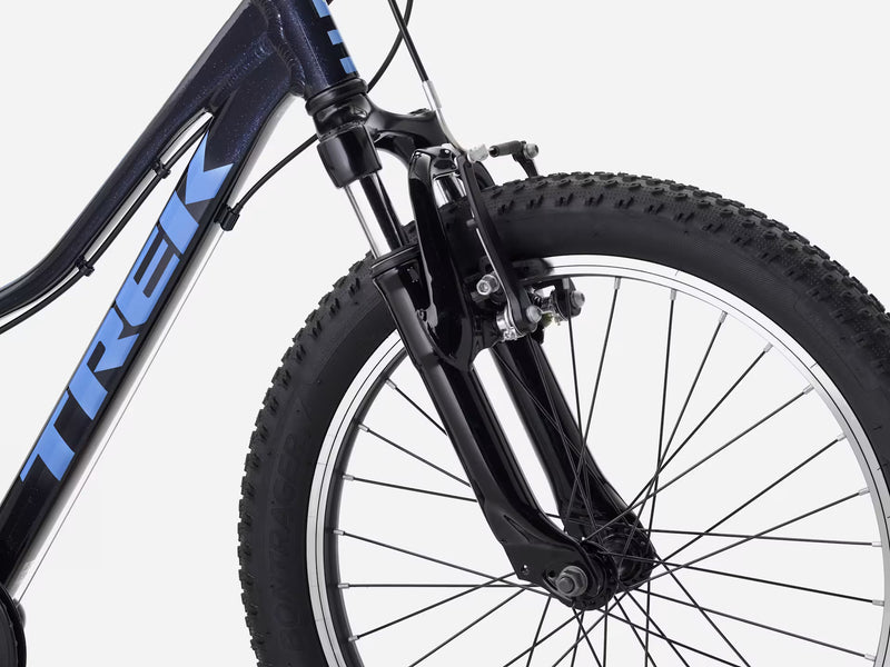 Close-up of a Trek bicycle wheel on a white background