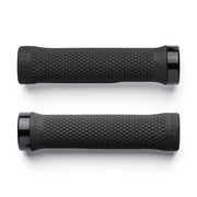 Two black bicycle grips with textured surface on a white background