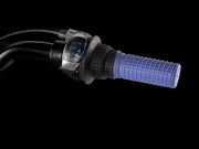 Close-up of a motorcycle handlebar with blue grip and control buttons on a black background