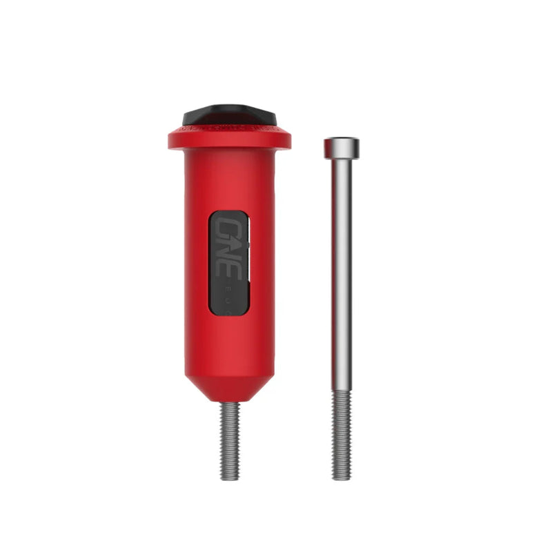 Red tool with a black component on a white background