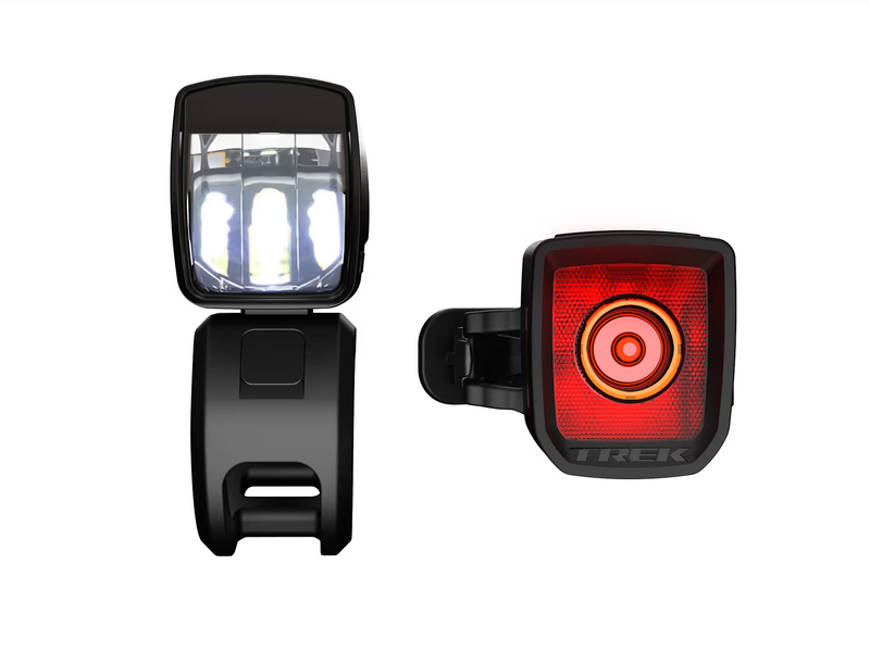 Front and rear bike lights with 'Trek' branding on a white background