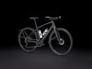 Black bicycle with visible branding on a black background