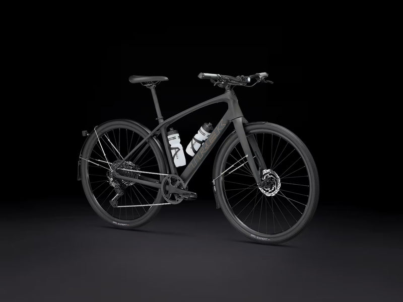 Black bicycle with visible branding on a black background