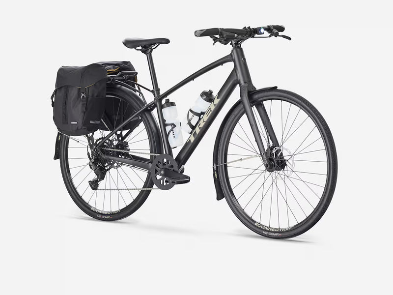 Black hybrid fitness bicycle with a bag and water bottles, against a white background,  showcasing how it handles accessories
