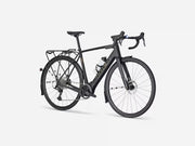 Product image of Trek road ebike Domane+ ALR 5 in black, product view with accessories (rear mounting rack, cage, water bottle)