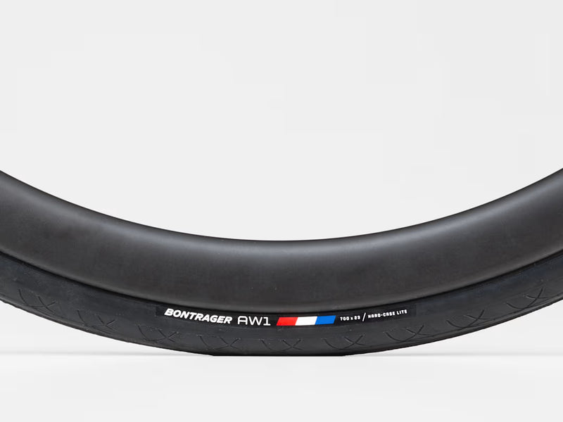 Bicycle tire with Bontrager AW1 branding on a light gray background
