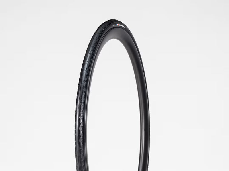 Black bicycle tire on a white background