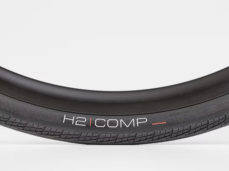 Close-up of a H2 COMP bicycle tire on a white background