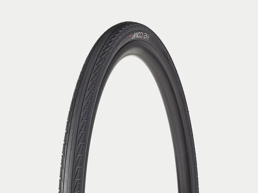 Black bicycle tire on a light gray background