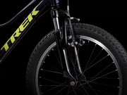 Close-up of a Trek bicycle wheel on a black background