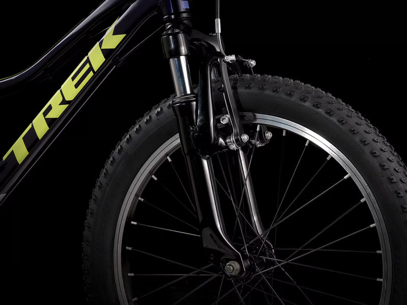 Close-up of a Trek bicycle wheel on a black background