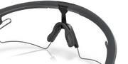 Black motorcycle helmet with clear visor on a white background