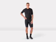Full body view of man wearing a trek cycling jersey and cycling shorts