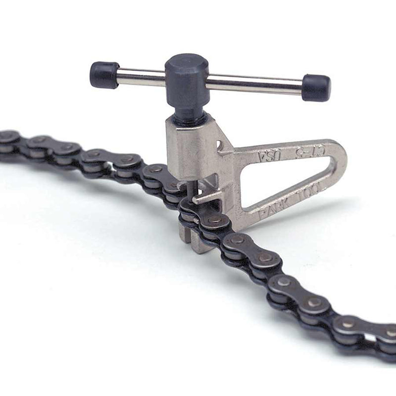 Bicycle chain tool with a chain on a white background