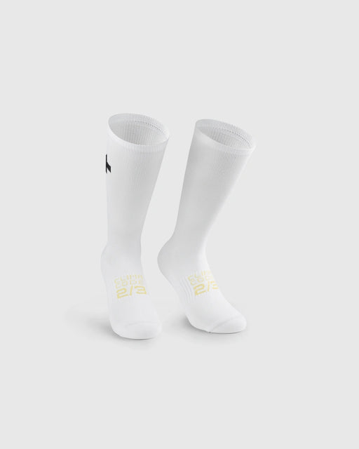 Image of Assos Spring Fall Socks P1, White, with a back Assos logo near the cuff and some writing in light yellow.